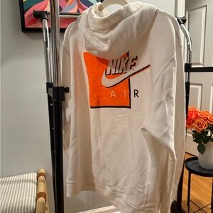 Nike Air Hoodie in White with Bold Orange Graphic
